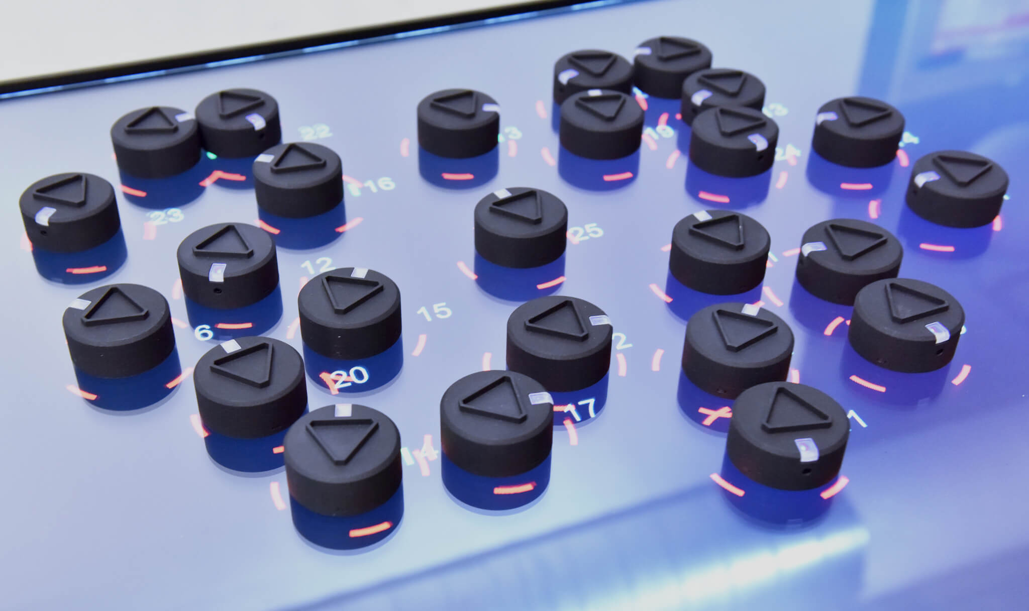 Swarm, tiny interactive robots that serve as tangible interfaces for a computer.