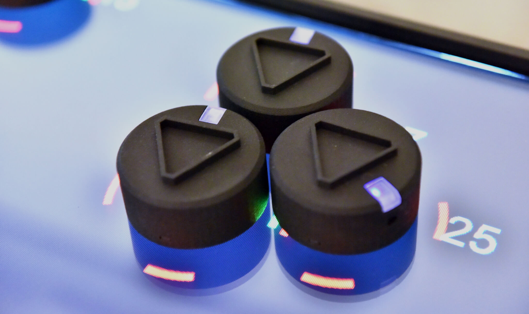 Swarm, tiny interactive robots that serve as tangible interfaces for a computer.
