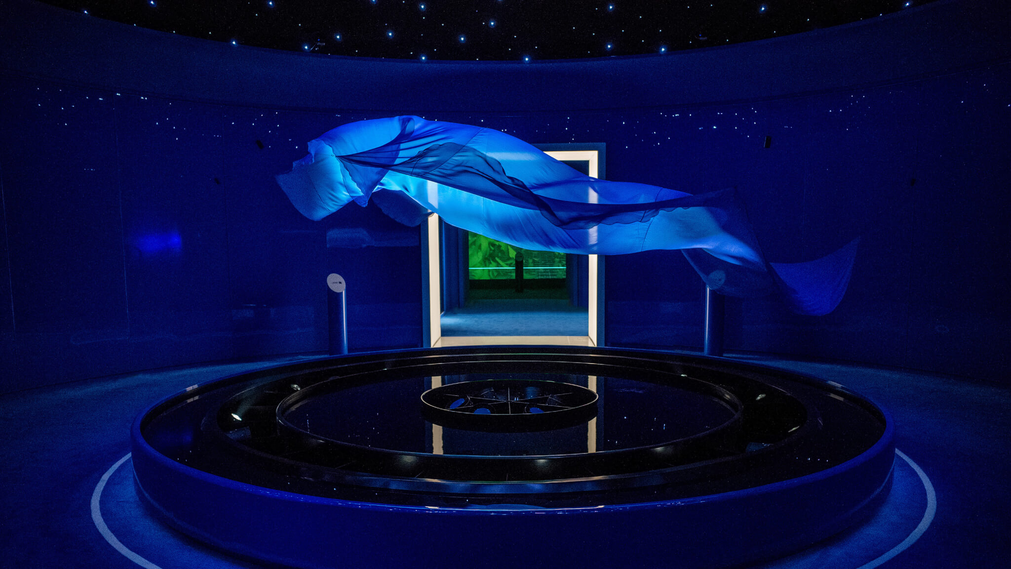 One art installation in an immersive experiential brand event in Shanghai. A silk wave floats in the air.